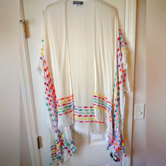 Pom Pom Rainbow Topper from Accessory Street is perfect for just a lite coverup - Picture 3 of 6